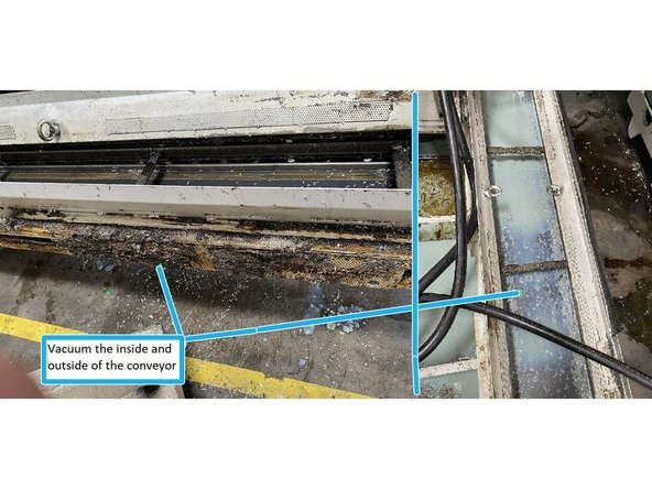 Once the coolant tank has been vacuumed out reinstall the conveyor into the tank.