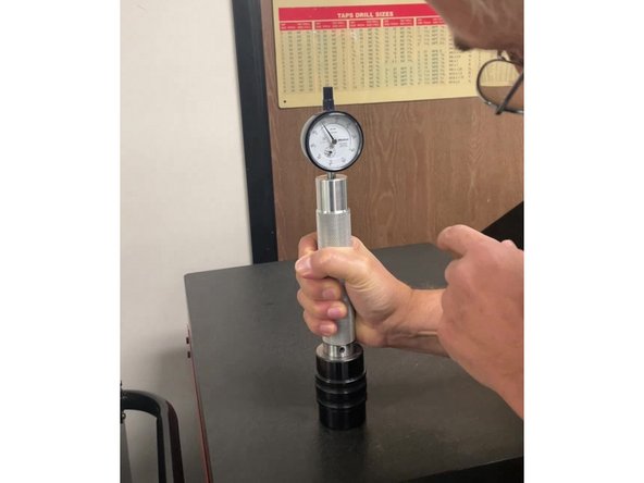 The first method of measuring the spindle bump out is with the Spindle Bump Out Gauge and Calibration Tool. This is the method used in the factory when the machines are being built.