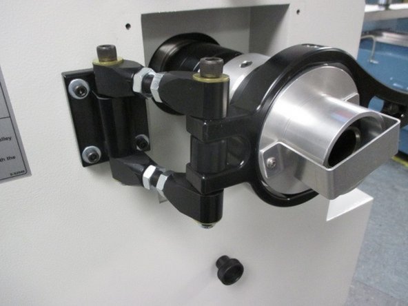 Slowly insert the collet draw tube assembly into the locating ring and stop when the draw tube makes contact with the 5C collet adapter. Rushing this step may cause the 5C collet adapter to become dislodged from the spindle and fall into the machine.