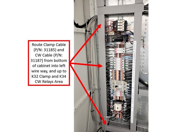 Route both cables of Assy P/N: 31234 (Clamp Cable P/N: 31185 and CW Cable: 31187) on bottom of cabinet into left wire way, and up to K32 Clamp and K34 CW Relays area.