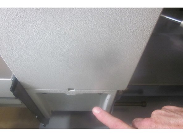 Jog the table to the front of the machine using the Y axis.