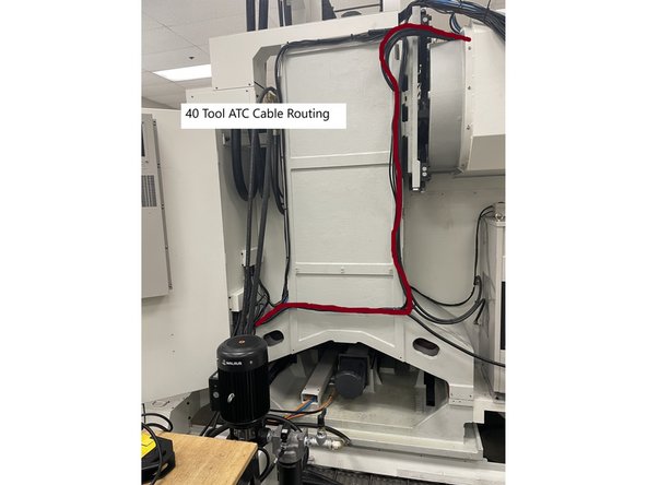 Route the ATC cables from the electrical cabinet up to the ATC cable junction box. See Photo 1 for cable routing path.