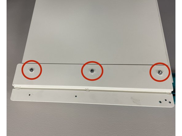 Next the Door Brackets need to be in contact with the corner of the Jigs see image 1. Now attach the Door Brackets with the nut plate and M5 screws with flat and serrated washers.