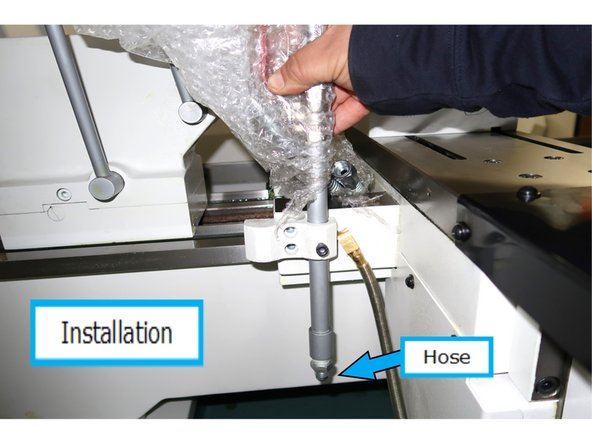 Here is the hose and valve shown at the location to be installed. Now you can connect the flexible hose routed from the pump into the work area to the fitting as shown. Use Teflon tape to seal the threads.