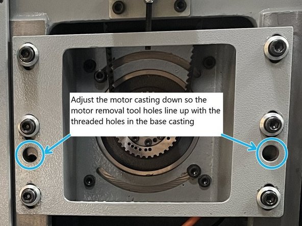 Once the belts are removed adjust the motor down until the two(2) threaded holes in the base casting line up with the through holes in the motor casting for the motor removal rods.
