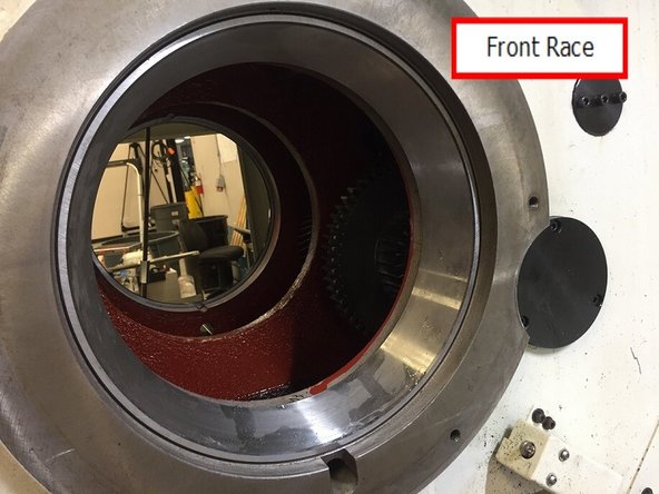 Verify the front bearing race bore is clean and free of debris, lightly stone any nicks or high spots.