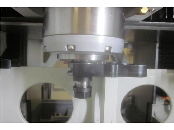 Go to service code 520. Press the &quot;ATC front&quot; key and the ATC jogs forward. Press the &quot;Input Table&quot; key. Highlight the Z height with the hand wheel and note the number in DRO on the RH lower corner.