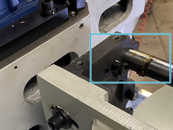 Once the carousel is aligned to the spindle hold the alignment screw with the Allen wrench and tighten the the jam nut then recheck the alignment to make sure nothing changed when the jam nut was tightened.
