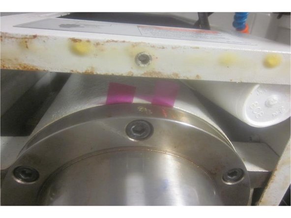 Raise the Z axis and install the remaining screws. Replace the shims and tighten all the screws firmly and evenly in a star pattern to 24 ft. lbs. Before tightening the lower coupler screws, adjust the gap in the coupler to approximately .100.&quot; Tighten the lower coupler screws .