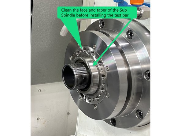 To check the alignment of the Sub Spindle you first need to remove the chuck or collet chuck from the Sub Spindle. Then once removed close the Hydraulic Chuck. The test bar must not be up against the threaded tube of the Hydraulic Chuck assembly. It must be against the spindle face.