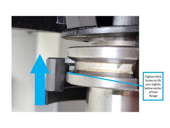 By hand, gently rotate the ATC arm, so that its tool finger is aligned below the tool in the ATC pot; the ATC arm should initially be lower than the tool.
