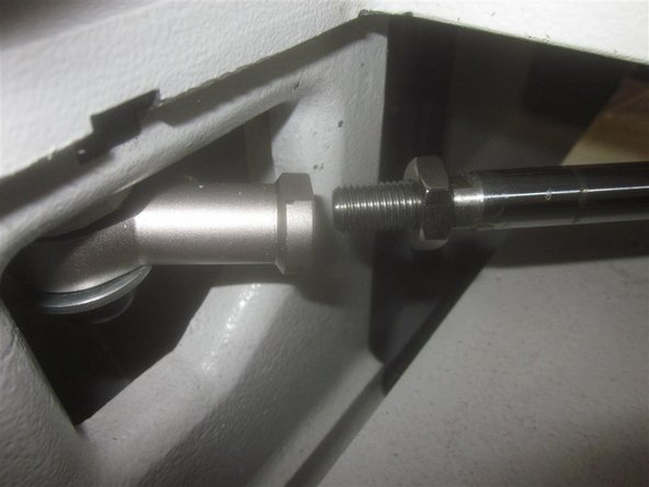 Remove the RH and LH front lower side panels that cover the chip tray and coolant tank. Remove the Y-Axis ball screw protective cover (small panel). Remove the chip tray. Drain the coolant tank. Remove the coolant tank. As the tank clears the front of the machine, remove the coolant pump and set inside the machine.