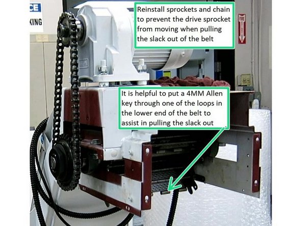 Once the belt has been installed onto the sprocket and aligned so that the master pin can be removed/installed, reinstall the motor sprocket, clutch sprocket and the chain, this will prevent the drive sprocket and driveshaft from rotating when you pull the slack out of the belt and attach it to the bottom side of the drive sprocket.