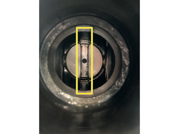 In order to function properly, the slot in S2 needs to be perfectly up and down. There are slots just outside the spindle at the top and bottom that must align with the slot in S2.