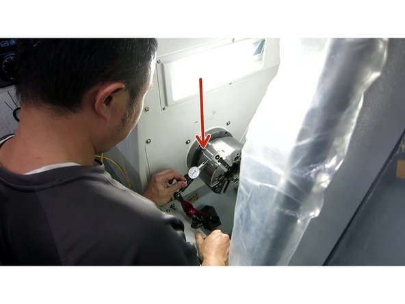 Set up a 0.0001&quot; dial indicator on the chuck and measure the runout. The runout on the perimeter and face should be less than .0002&quot; (5um). Tighten the six(6) mounting screws in a crossing pattern while watching the runout. Verify the runout stays in spec while tightening the screws. Torque to 58ft-lbs. See Photo 1