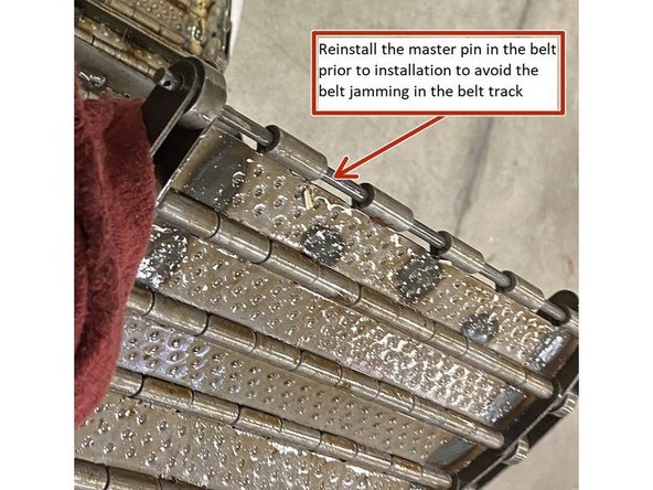 Once the conveyor has been cleaned out, it's time to reinstall the belt. Prior to reinstalling the belt, install the master pin back into the belt making sure to attach it through all of the belt link parts. This will prevent the belt links from jamming up in the belt track and prevent it from being able to be fed all the way through the conveyor.