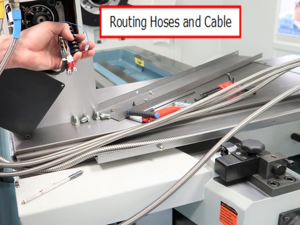 Several hoses and a electric cable need to be routed thru this channel before the upper cover is installed.