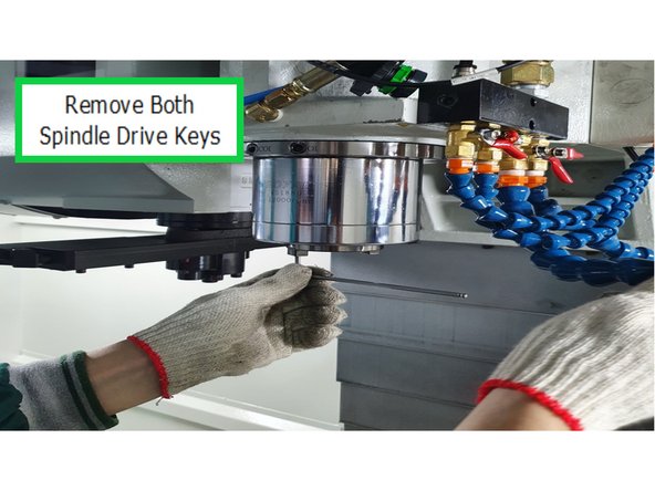 Use hex wrench to remove both spindle drive keys.