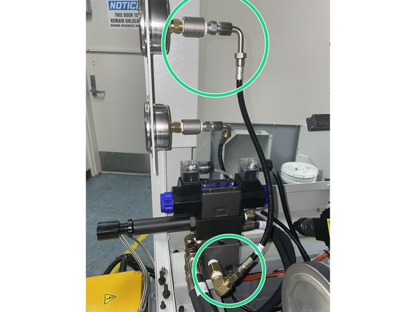 Install fittings and Oil Line P/N 35092-6 to the upper gauge and down to the right side of the manifold as shown in Photo 2. Hydraulic line orientation viewed from looking at the gauges.