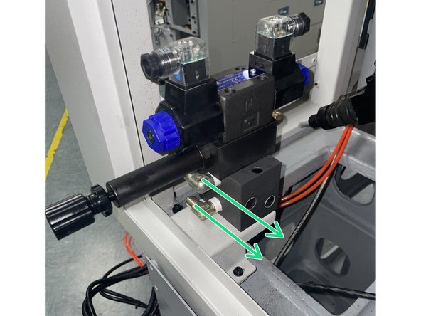 Next mount the solenoid assembly to the mounting bracket and tighten the two (2) 90 degree fittings 180 degrees to point towards the hydraulic cylinder. See Photos 2 and 3