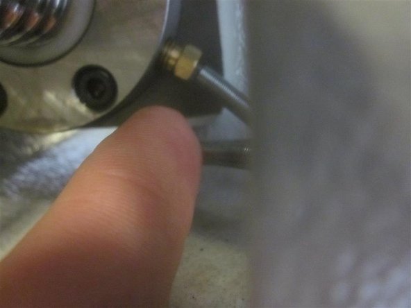 Install and tighten the front (2) screws of the RH bearing housing to the casting. Torque all to 11 ft. lbs. Tighten the five (5) screws for the ball nut to the yoke. Torque to 7 ft. lbs. (84 in. lbs.).