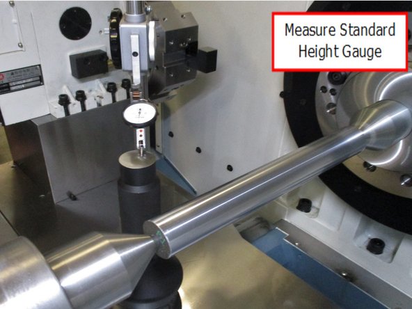 Zero out the dial gauge on the standard height gauge.