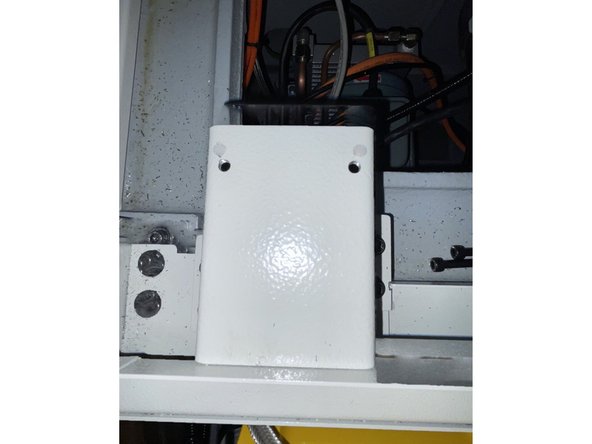 Locate the clamp/ unclamp solenoid mounting bracket (35092-3) and install it to the casting.