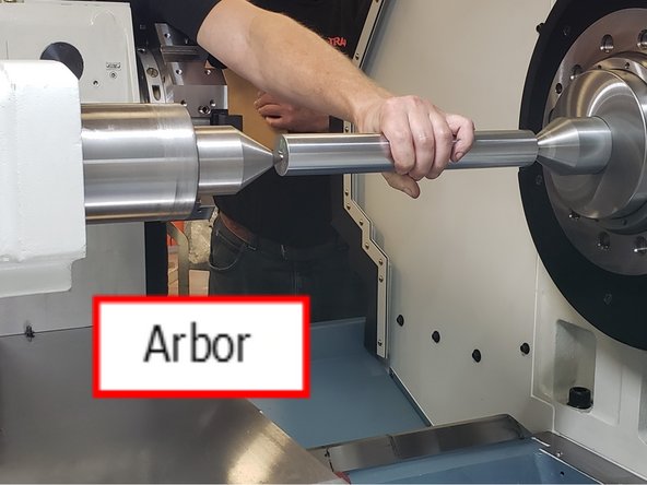 TRAK has a documented diameter arbor used to place between two dead centers to easily measure the height of the center line of lathe. Install a dead center in the headstock and another in the tailstock.