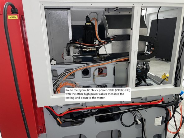 Route the Hydraulic Pump Power cable with the Spindle Motor Power cable along the outside of the casting and follow it into the casting to where the hydraulic pump motor will be installed.