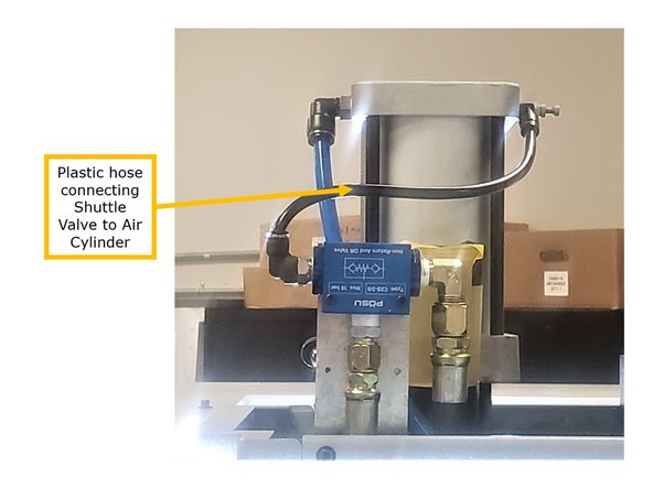 Install the bracket above the standoffs with two M6 x 16 25B bolts, two M6 split washers, and two M6 washers flat.  Note the specific design of the bracket to avoid moving the standoff bolts. Install the Shuttle Valve itself onto the bracket with two M4 x 40 25B bolts.