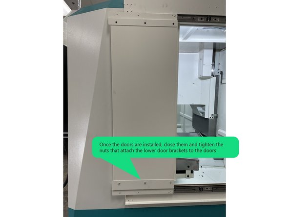 Install the lower Door Brackets to the bottom of the doors and make the M5 nuts with flat and serrated washers slightly loose for now.