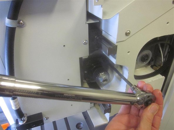 Rotate the ball screw moving the spindle all the way towards the right hand side but not against the cushion. This will align the ball nut with the angular contact bearings.