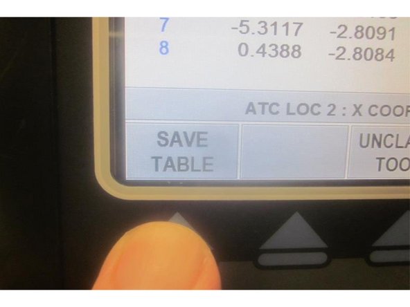 Press the &quot; Unclamp Tool &quot; key. Air will purge through the spindle. Slowly lower the Z axis until the air just stops then slowly raise it until the air just starts. Note the number for Z in the DRO display. Add (-) .010&quot; to it and enter this number in the display then press ABSet. Press the &quot;Save table &quot; key.