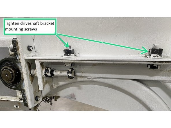 Once the tension has been adjusted and the jam nuts have been secured, tighten the driveshaft bracket mounting screws to secure the driveshaft.