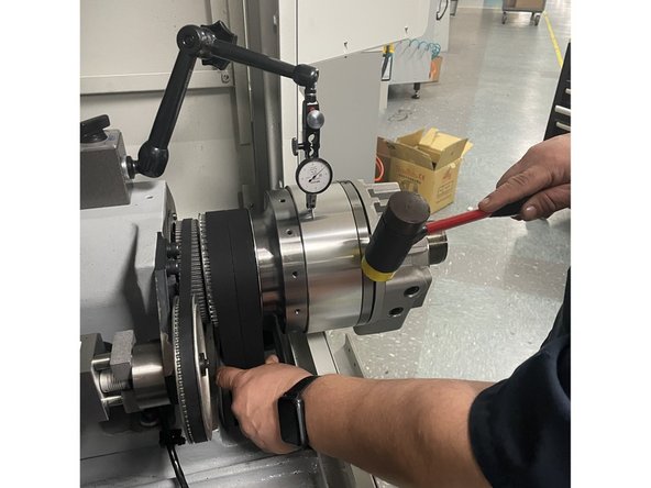 You will need to rotate the cylinder for the holes in the cylinder to line up with the holes in the sleeve and the adapter. Once the first 2 screws have been started you will need to rotate the cylinder and spindle to install the remaining (4) screws through the Sleeve body and into the cylinder.