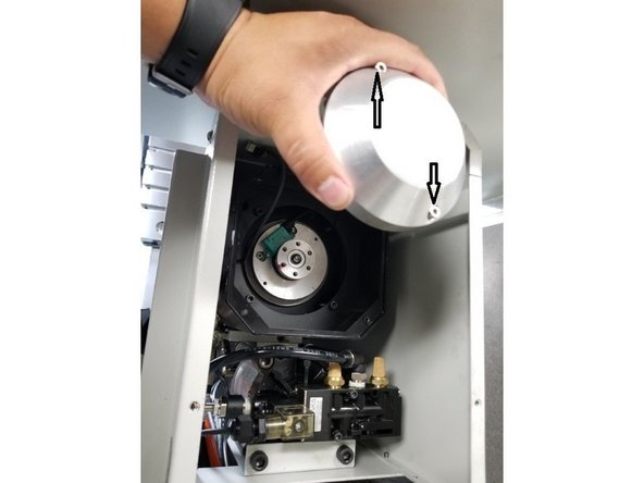 Use a 3mm long T-handle hex key or equivalent and loosen the two (2) 4mm SHCS that retain the (Encoder Housing Cover) until they are out of their threads. LEAVE THE SCREWS IN THE COVER to prevent them from dropping inside the motor.