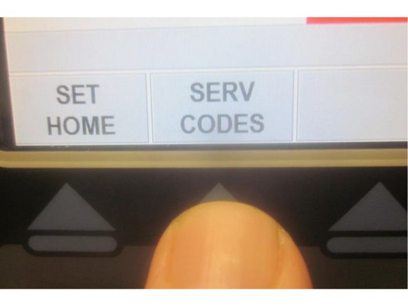 The display now reads "Set Tool Change Locations (X,Y, Z)." Press the "ATC Front " soft key. Press "Go" and the ATC comes forward.