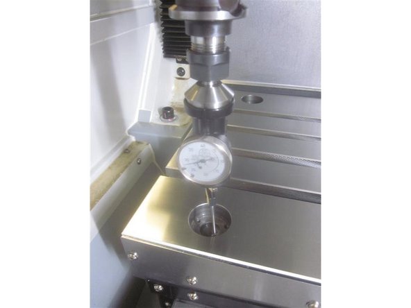 Install a tool holder with the co-axial indicator in the spindle. Go to DRO, and set the spindle speed at 150 rpm. On M11's, go to service code 500. (On M10's, press &quot;code number&quot; first, then enter 500, and press ABS SET).