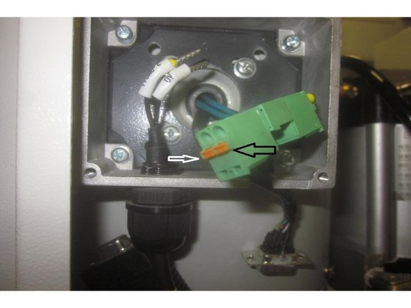 Remove the cover on the upper electrical junction  box where the encoder and fan wires connect.