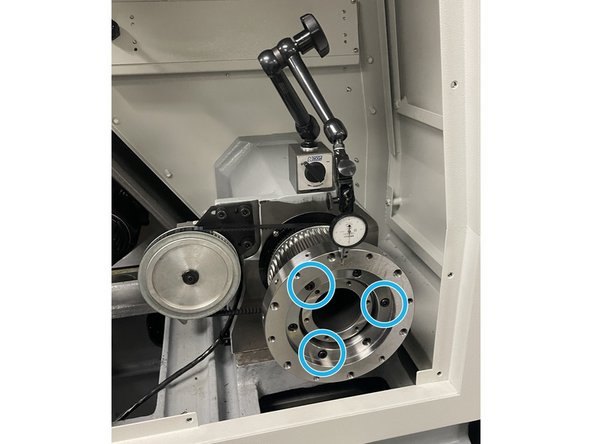 Install the hydraulic chuck adapter ring.Tighten until it stops on high speed pulley and then loosen until you can install the three(3) long screws through the adapter and drive pulley and thread into the encoder pulley. Snug them for now, do not tighten.