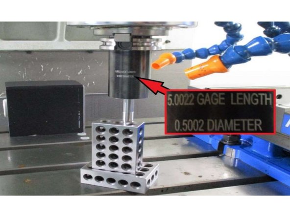 Lower the calibration tool below the height of the stacked 1-2-3 blocks.