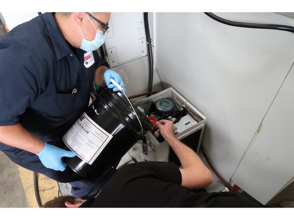 TRAK recommended oil: Quality ISO 32 oil, Anti-Wear additive.  Pump capacity 4 liters which may need to be topped off once lines and spindle passageway is filled.