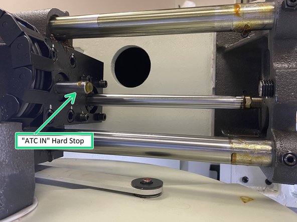 You may find it easier to raise the Z Axis to max travel so there is more room to get the Allen wrench onto the adjustment screw while making adjustments and then lowering back down to check alignment.