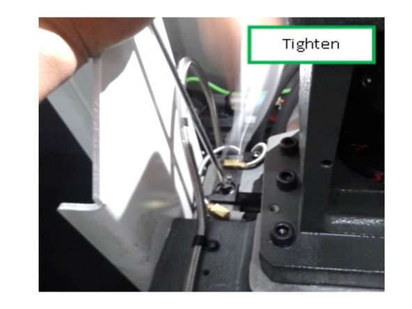 Hold the screw in place with a flathead screwdriver to prevent rotation.