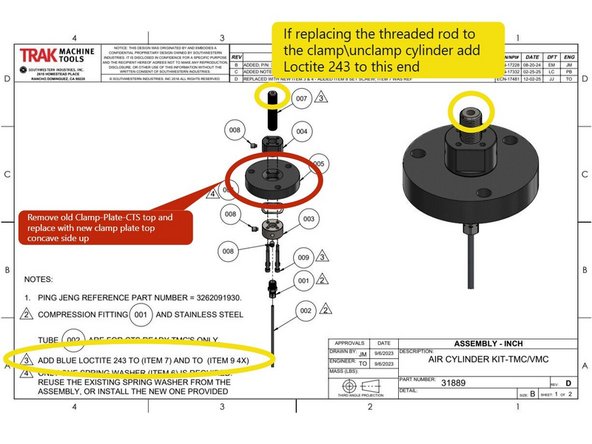 Remove the blue and black air lines from the Clamp\Unclamp cylinder.