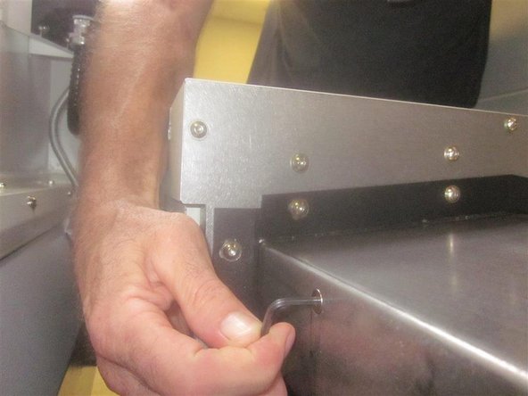 Remove the six (6) FHSC screws from the sides of the Y-Axis cover.