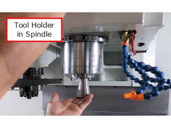 Put 3 in 1 tooling (clamping) tool holder into spindle.