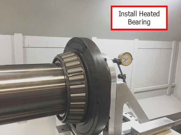 Do not heat the bearings above 180° F (82° C). AFTER the bearings are heated, apply a generous coat of DTE 24 oil to the bearing and inner race before installing onto the spindle.
