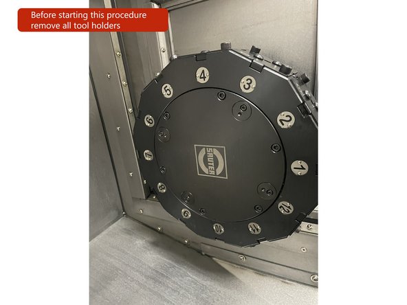 When starting this procedure for safety reasons please remove all tool holders and confirm the hydraulic pressure is at 50kg.