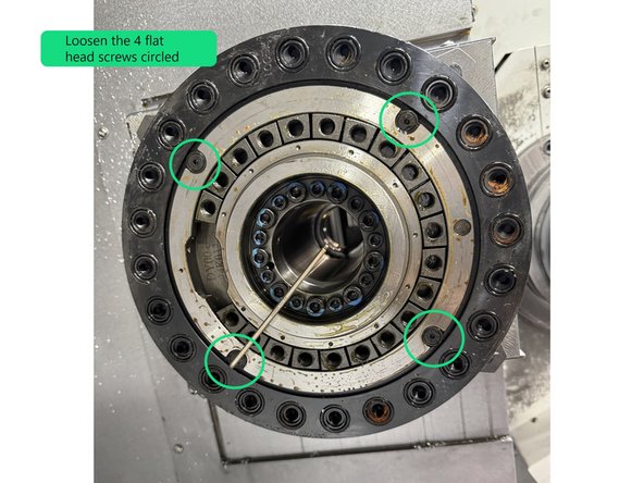 There are 21 M10 screws that attach the Turret Disk to the Turret Assembly. Support the Turret Disk with your lifting device and remove the 21 screws. Once the screws have been removed tap the Turret Disk out with a plastic tip hammer or mallet.